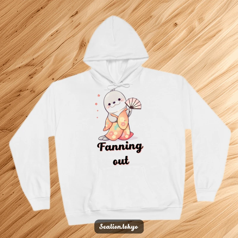 Funny hoodie depicting a sea lion in a traditional kimono, gracefully bowing with a decorative fan in motion.