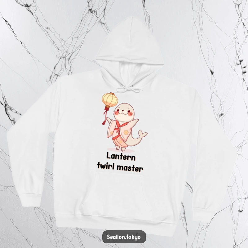 Funny sealion hoodie depicting an elegant kimono-clad dancer gracefully twirling a paper lantern, cozy and artful.