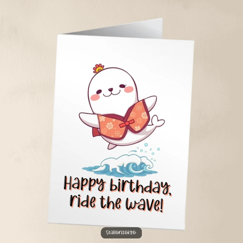 Free Printable Birthday Card: Sea lion wearing a festive kimono joyfully leaping over a small wave